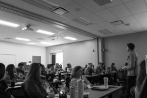 Rutgers CCSMH team member running a group activity at a training.